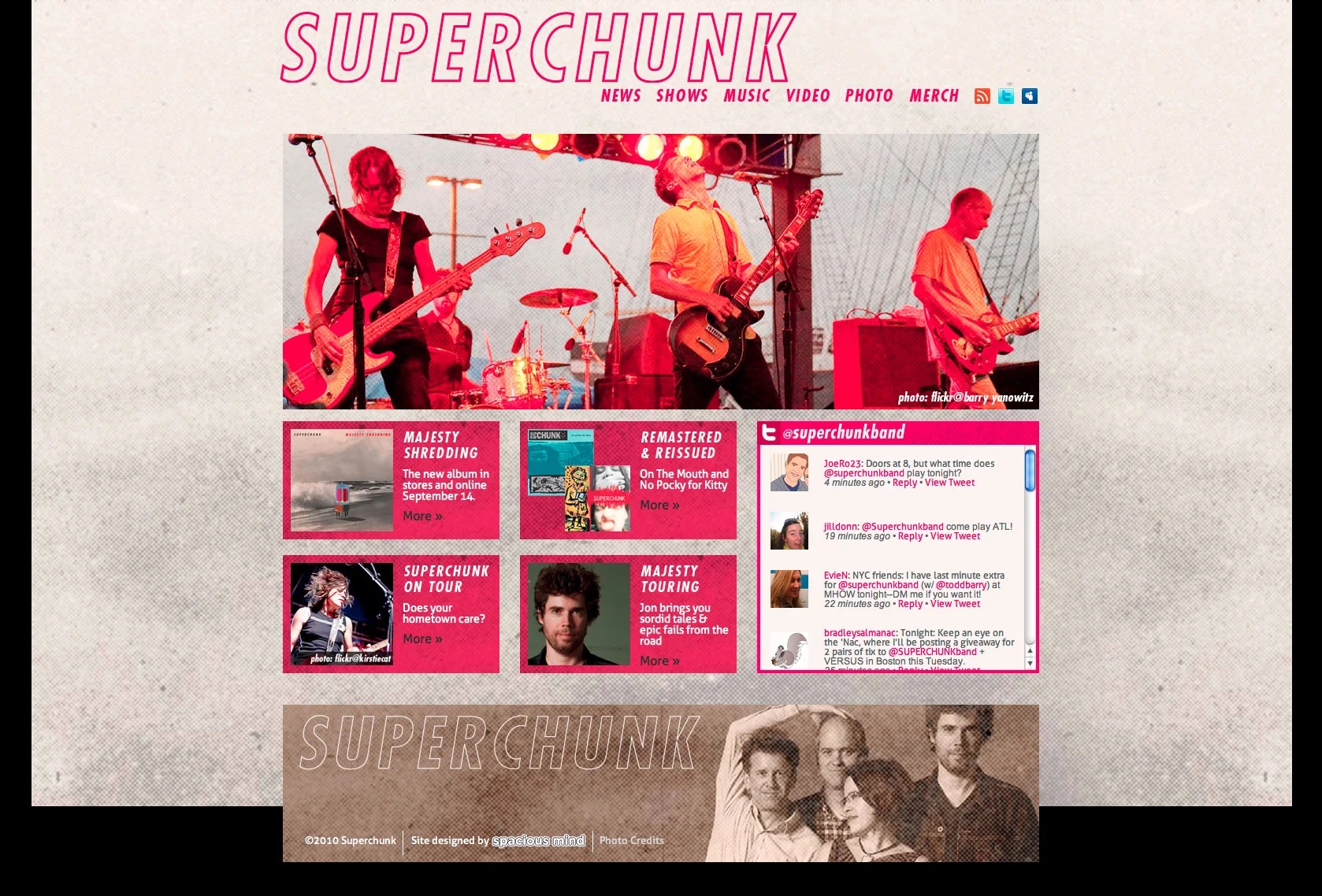 A concert photograph of Superchunk featured on the band's website